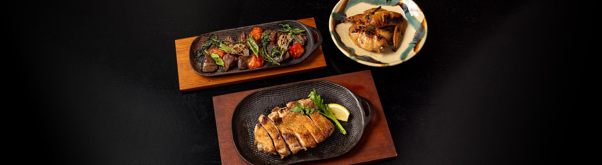 小布施 寄り付き料理 蔵部 銀座の石窯料理(福味鶏の塩焼き、黄金シャモのモツ焼き、手羽先の黒酢照り焼き)